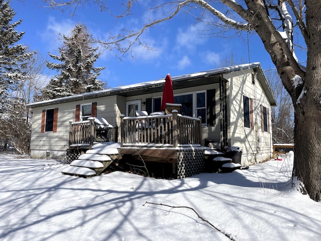 ranch-style house with a deck