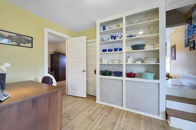 home office with light wood-type flooring