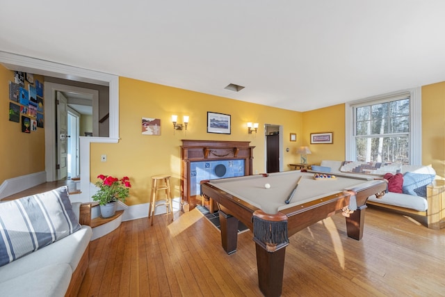 playroom with pool table and light hardwood / wood-style flooring