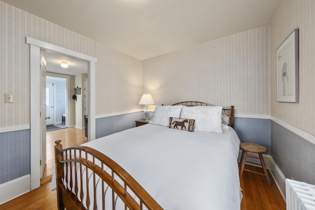 bedroom featuring wood-type flooring