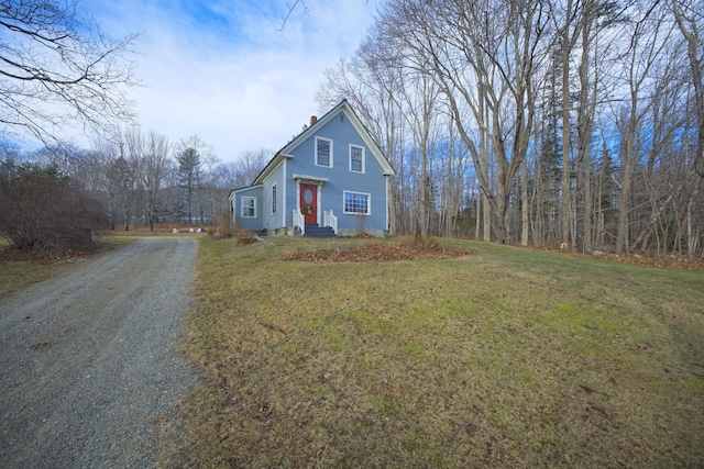 view of front of property with a front lawn