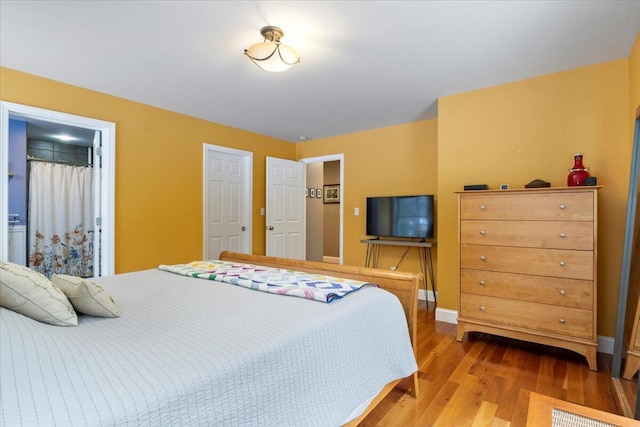 bedroom with light hardwood / wood-style floors