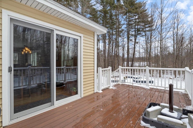 view of snow covered deck