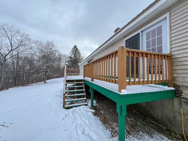 view of snow covered deck