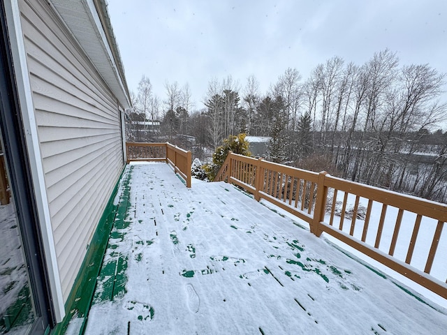 view of snow covered deck