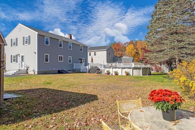 view of yard featuring a pool side deck