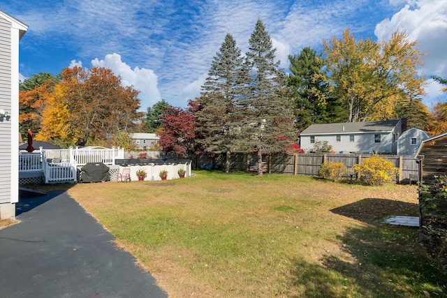 view of yard with a covered pool