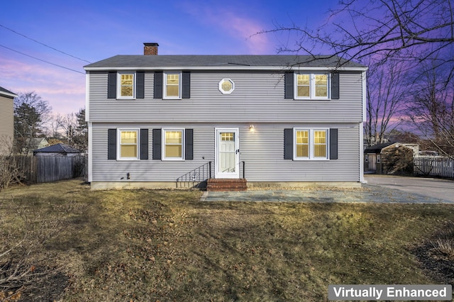 view of front of house with a lawn