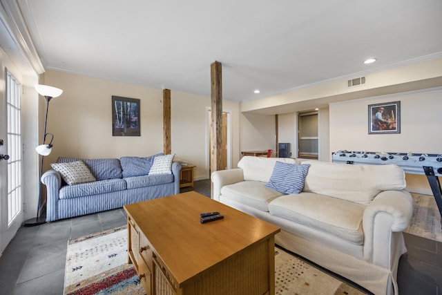 living room with ornamental molding