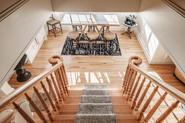 staircase featuring hardwood / wood-style flooring