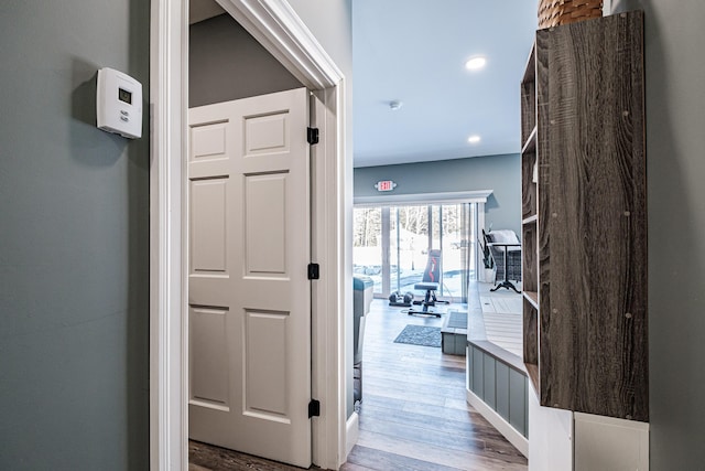 corridor featuring hardwood / wood-style flooring