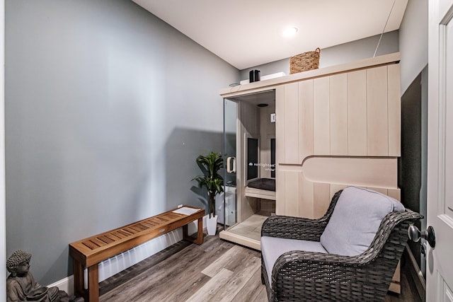 sitting room with light hardwood / wood-style floors