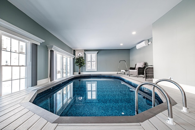 view of swimming pool featuring a wall unit AC and a hot tub