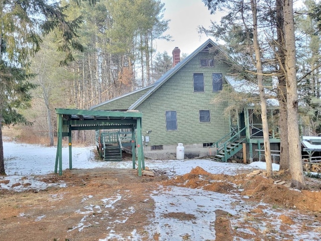 view of snow covered property