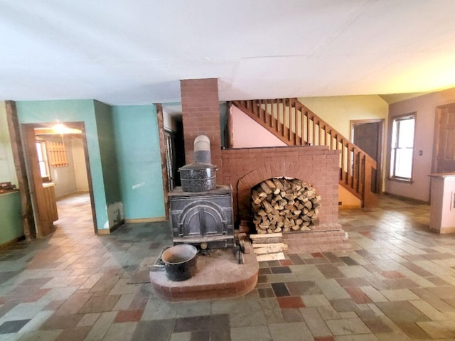 living room featuring a wood stove