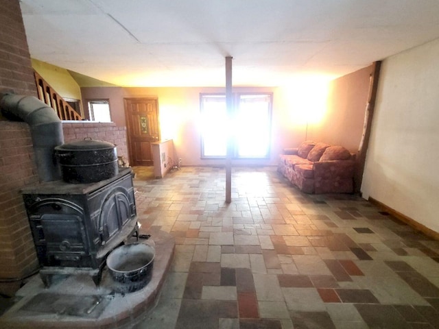 living room with a wood stove