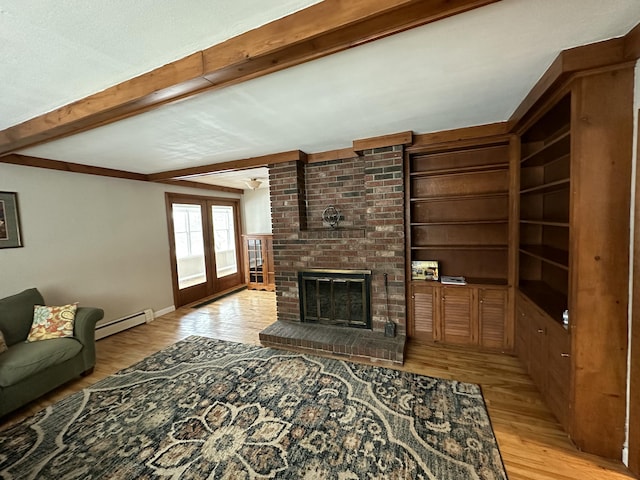 living room featuring a fireplace, french doors, light hardwood / wood-style flooring, and a baseboard heating unit