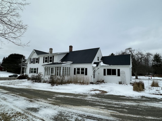 view of snow covered property