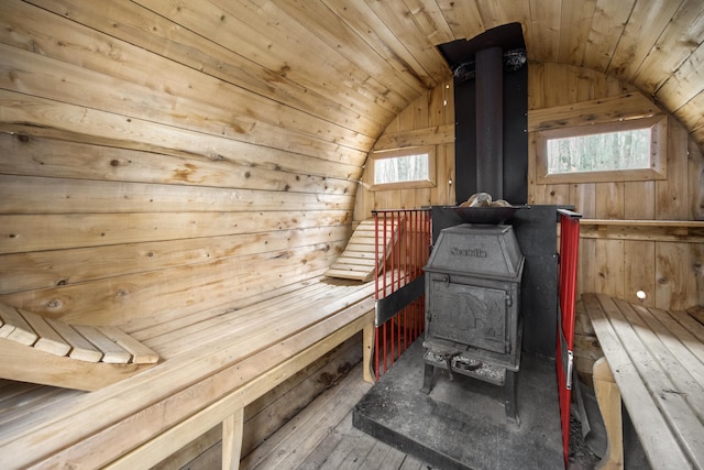 view of sauna featuring wood-type flooring and a healthy amount of sunlight