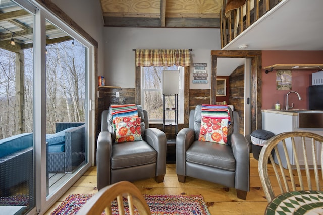 living area with light hardwood / wood-style flooring