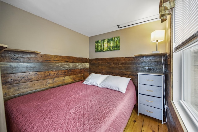 bedroom featuring wood-type flooring