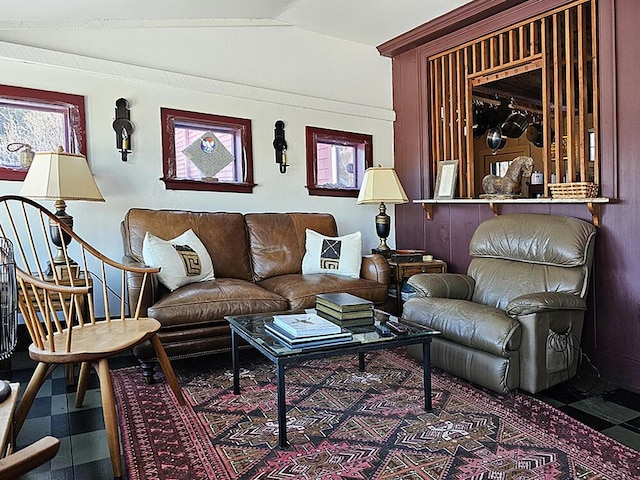 living room with lofted ceiling