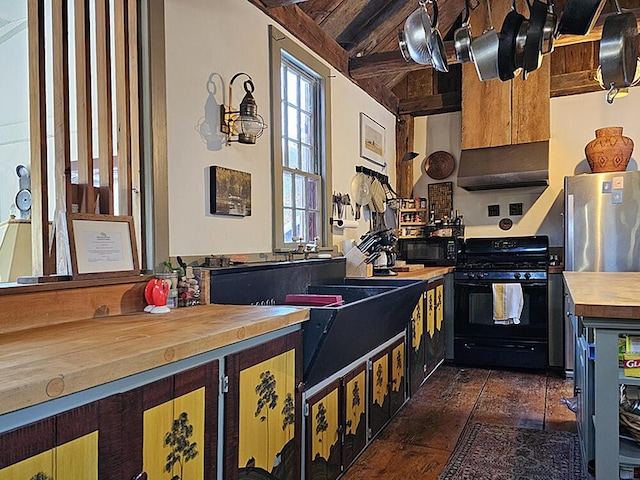 kitchen with black appliances, wood ceiling, wood counters, and lofted ceiling with beams