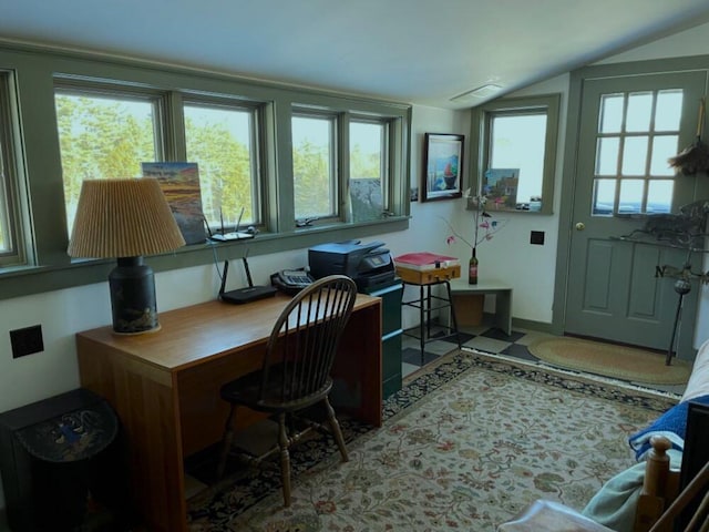 office area featuring vaulted ceiling