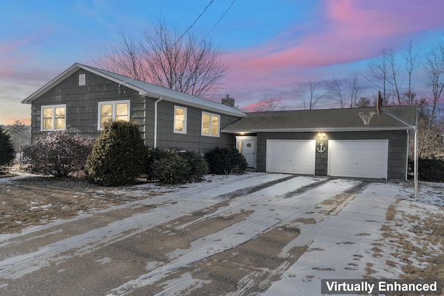 view of front of property with a garage