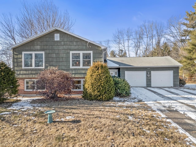 view of front of property with a garage