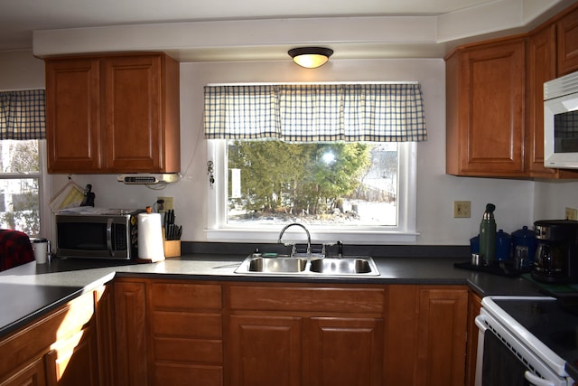 kitchen with stove and sink