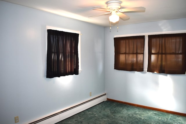 carpeted spare room featuring a baseboard radiator and ceiling fan