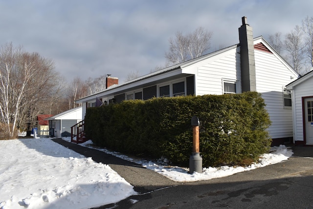 view of snow covered property