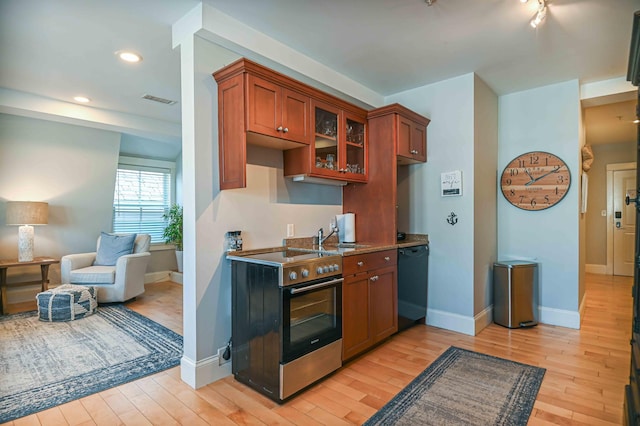 kitchen featuring light hardwood / wood-style floors, stainless steel electric range oven, and black dishwasher