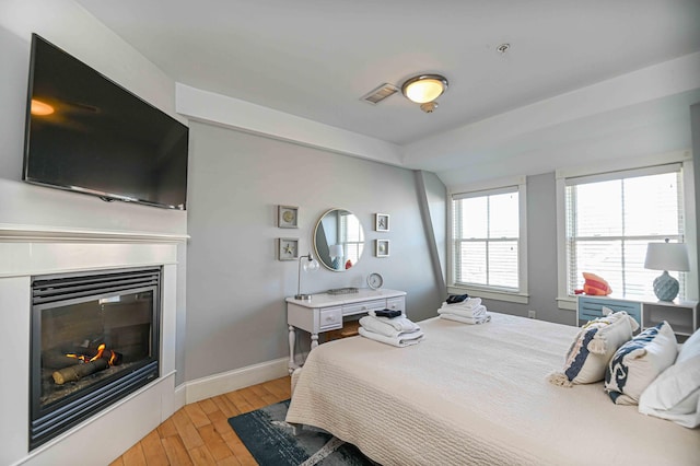 bedroom with light wood-type flooring