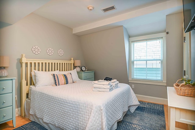 bedroom with light hardwood / wood-style flooring