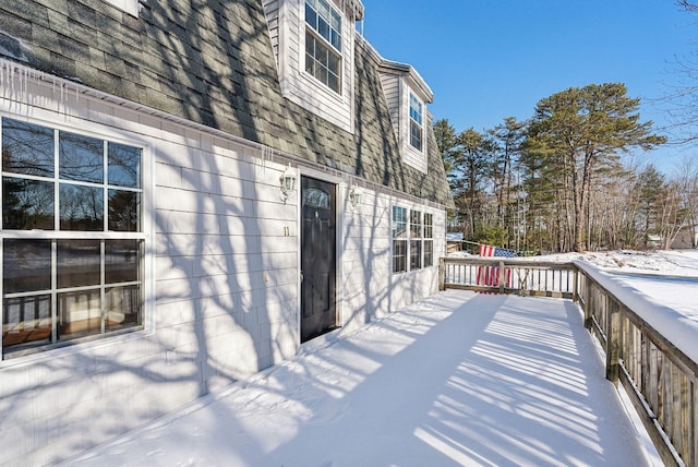 view of snow covered deck