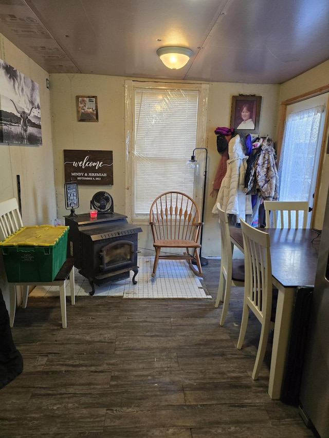 dining area with dark wood-type flooring