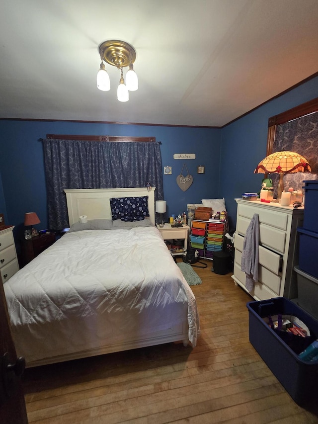 bedroom featuring hardwood / wood-style floors