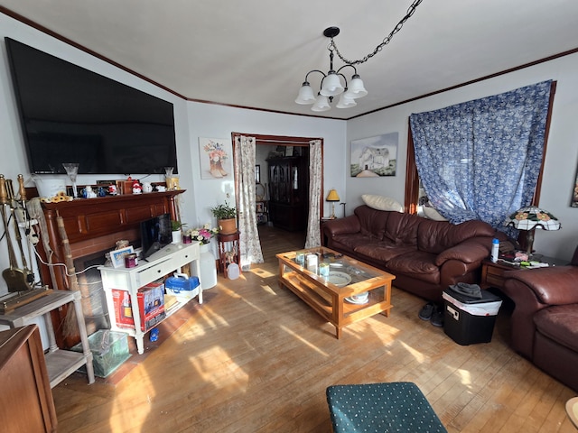 living room with hardwood / wood-style floors and a notable chandelier