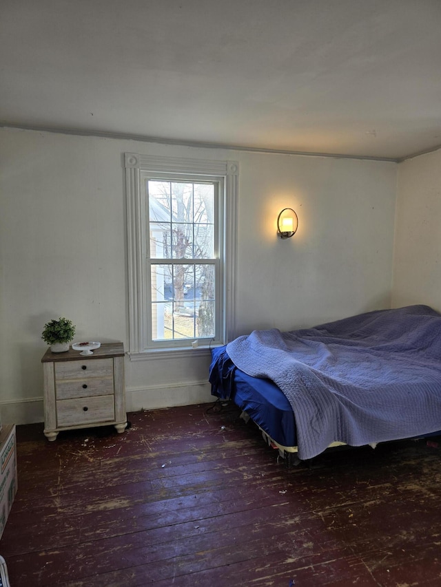 bedroom featuring dark hardwood / wood-style floors