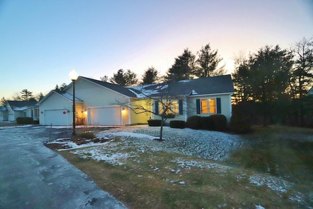 view of front of home with a garage