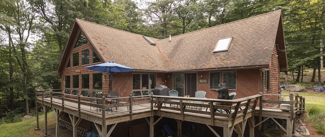 rear view of house with a deck