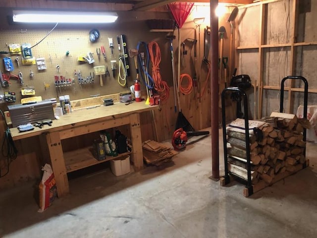 basement with a workshop area