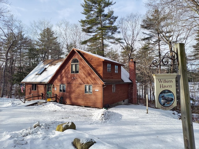 view of snow covered property