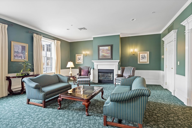 living room featuring ornamental molding and carpet flooring