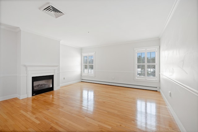 unfurnished living room featuring a baseboard radiator, ornamental molding, and light wood-type flooring