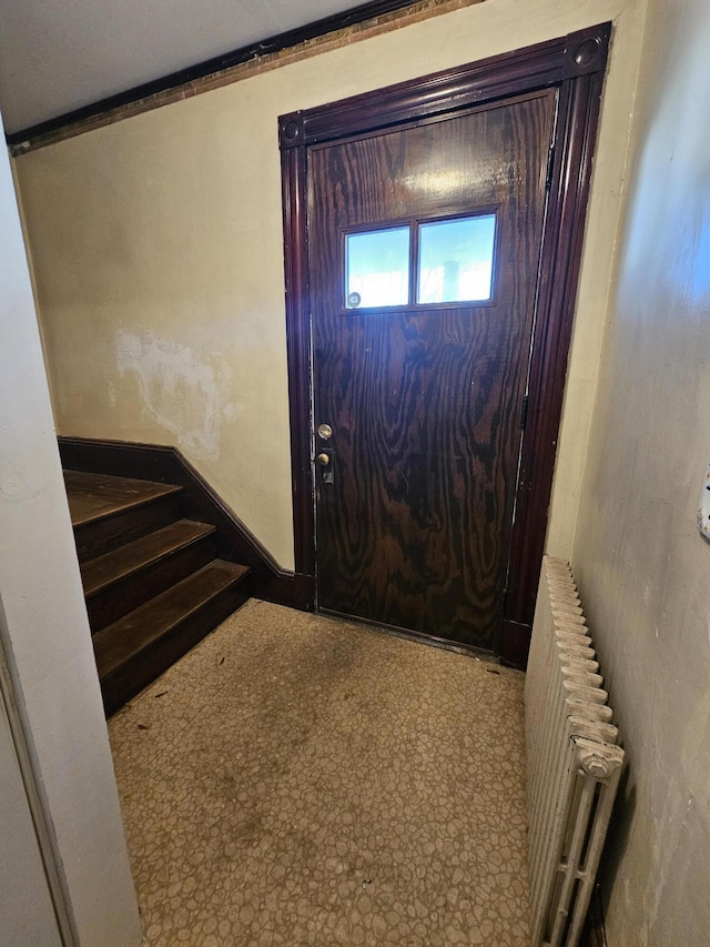 entrance foyer with radiator heating unit