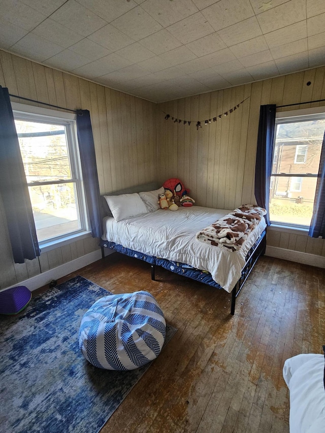 bedroom featuring dark hardwood / wood-style flooring