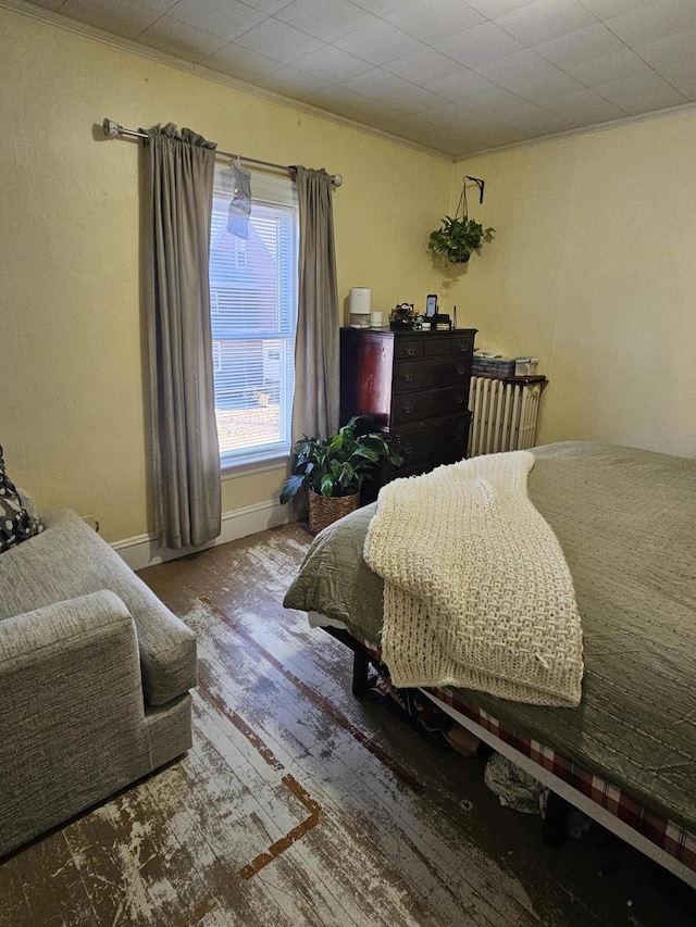 bedroom with crown molding